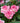 Three pink-and-white roses in full bloom surrounded by green leaves.
